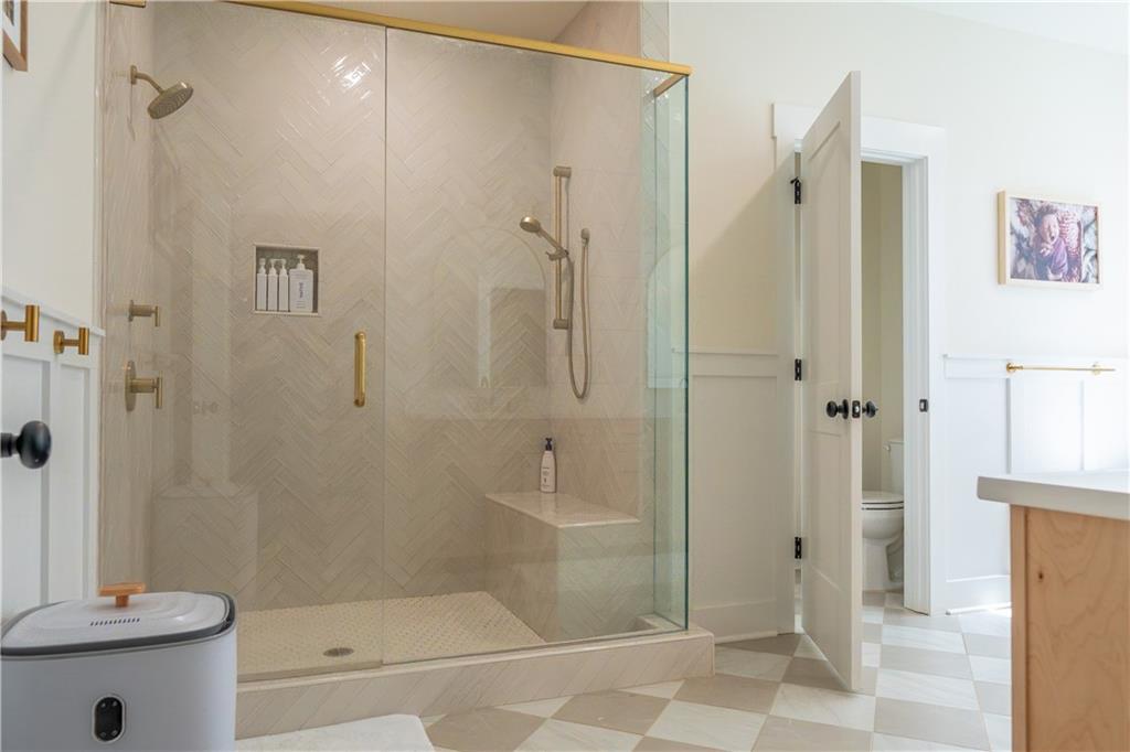 526 Brice Station Road Silver Creek, GA 30173 - Photo 17 of 32 a bathroom with a shower and a toilet