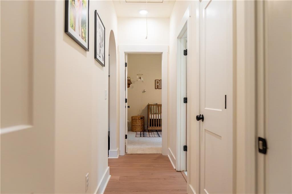 526 Brice Station Road Silver Creek, GA 30173 - Photo 21 of 32 a view of a hallway with a livingroom and dining room