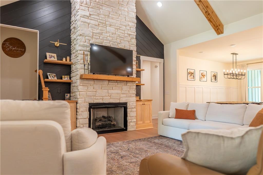 526 Brice Station Road Silver Creek, GA 30173 - Photo 5 of 32 a living room with furniture and a fireplace