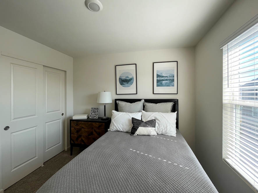 17325 Roscommon Road Tinley Park, IL 60477 - Photo 20 of 37 a bedroom with a bed and a window