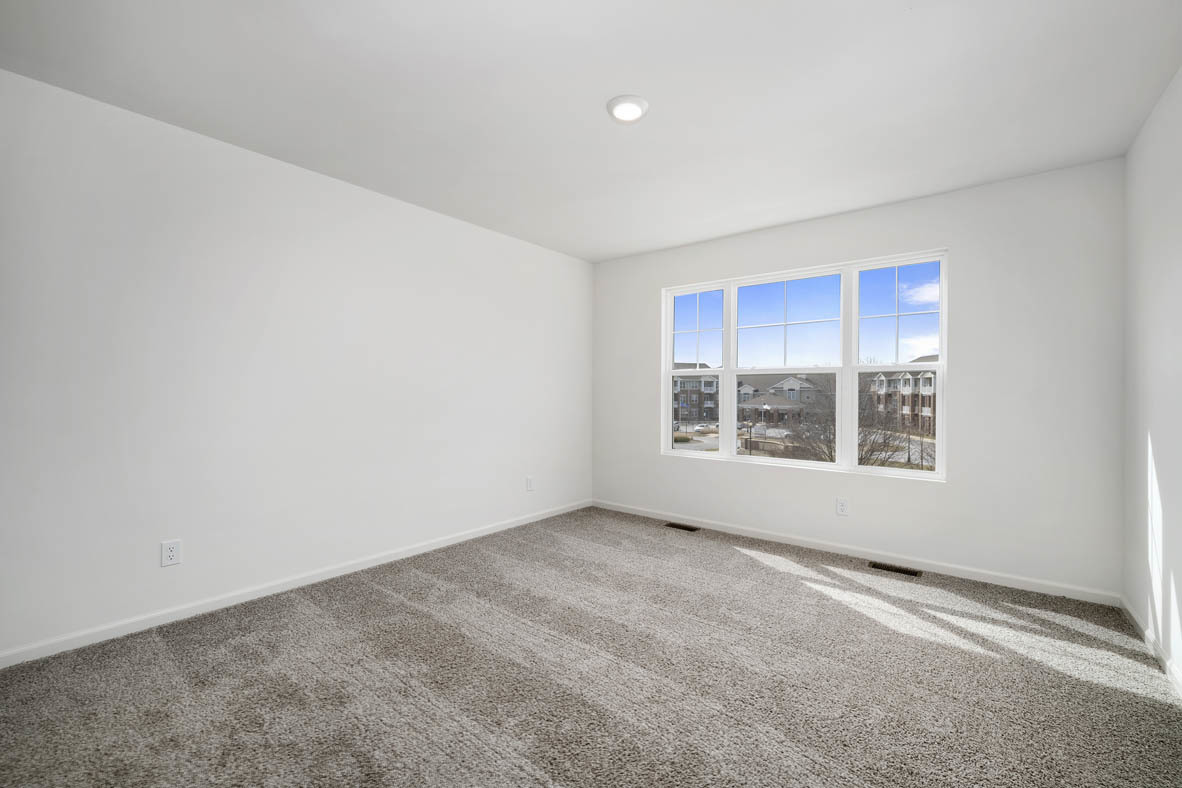 17325 Roscommon Road Tinley Park, IL 60477 - Photo 31 of 37 a view of an empty room with a window