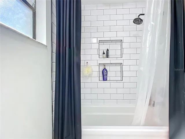a bathroom with a bathtub