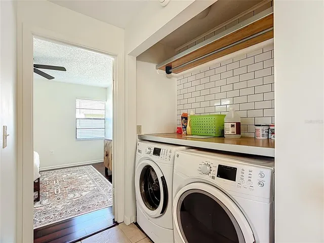 a utility room with dryer and washer