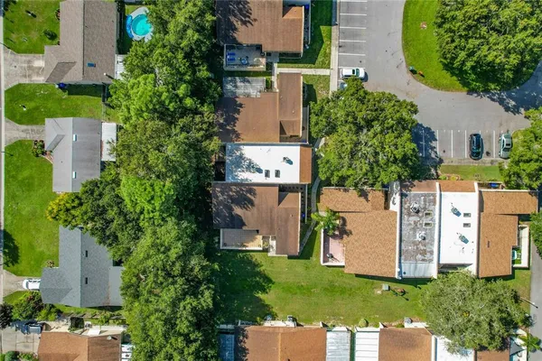 an aerial view of a house with a garden