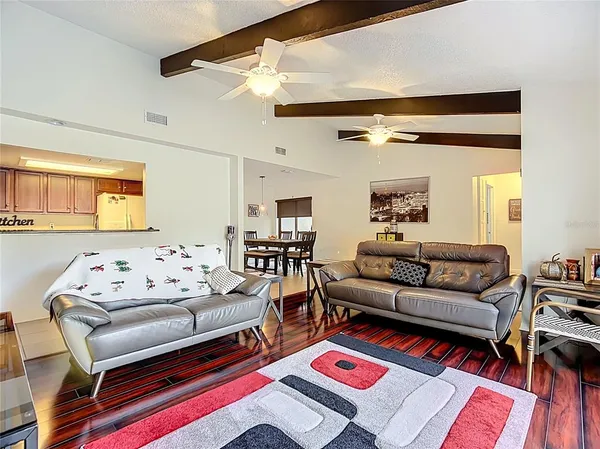 a living room with furniture and a couch