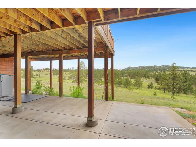 a view of a yard from a balcony