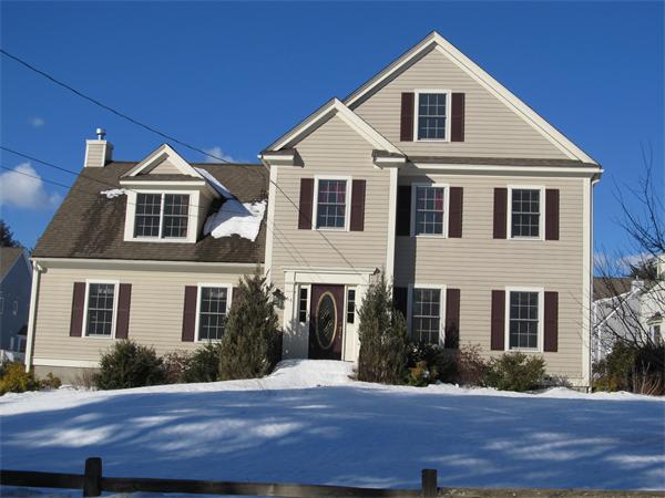 64 Clark Road Shirley, MA 01464 - Photo 4 of 25 a front view of a house with a yard