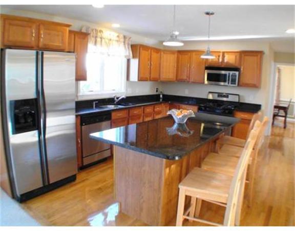 64 Clark Road Shirley, MA 01464 - Photo 5 of 25 a kitchen with stainless steel appliances granite countertop a sink a stove and a refrigerator