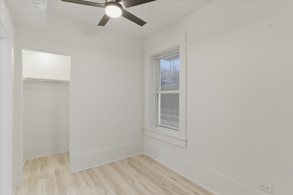 2607 West Haddon Avenue, Unit 2F Chicago, IL 60622 - Photo 10 of 12 an empty room with windows