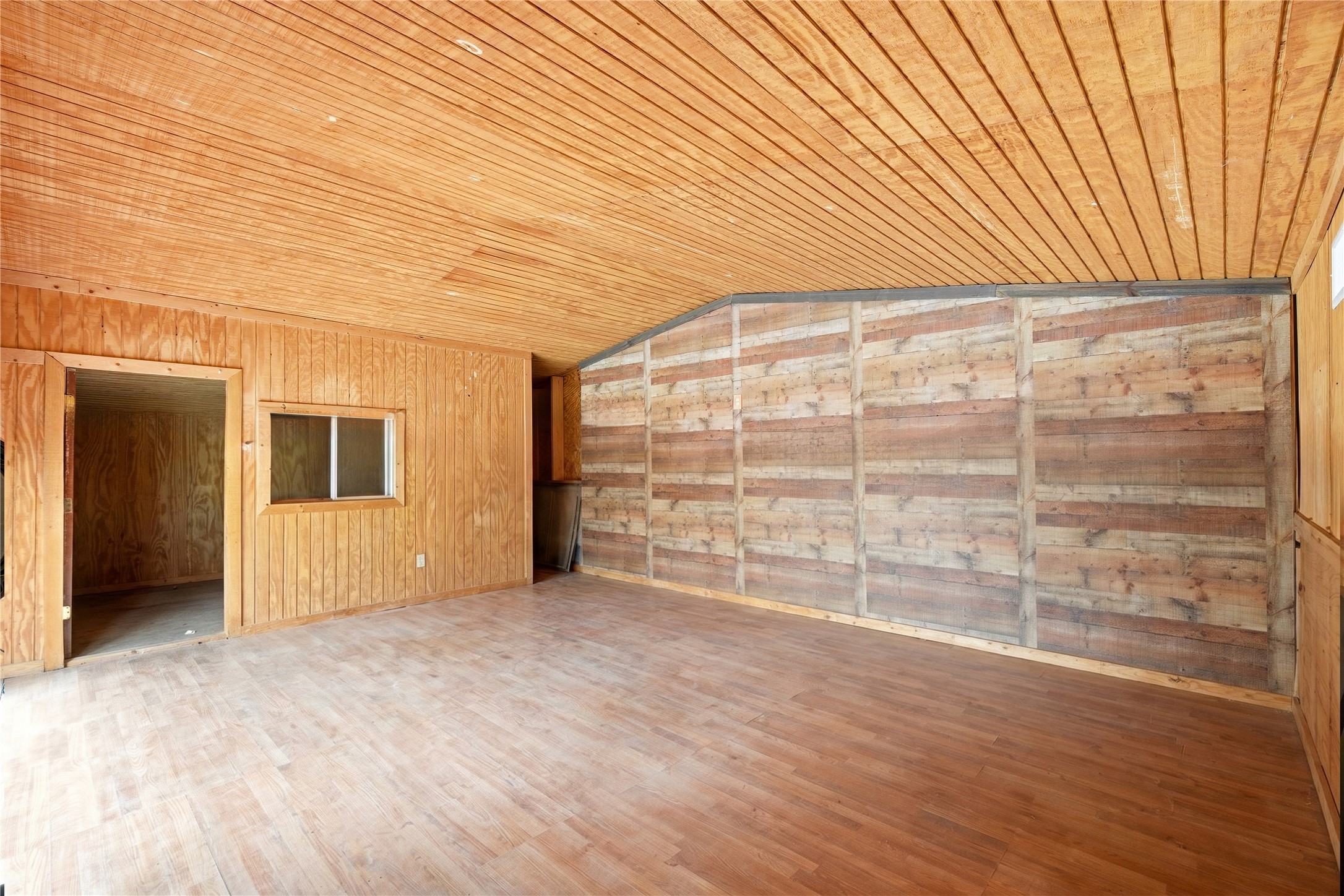 11741 Ezekiel Road Tomball, TX 77375 - Photo 21 of 30 an empty room with wooden floor and windows