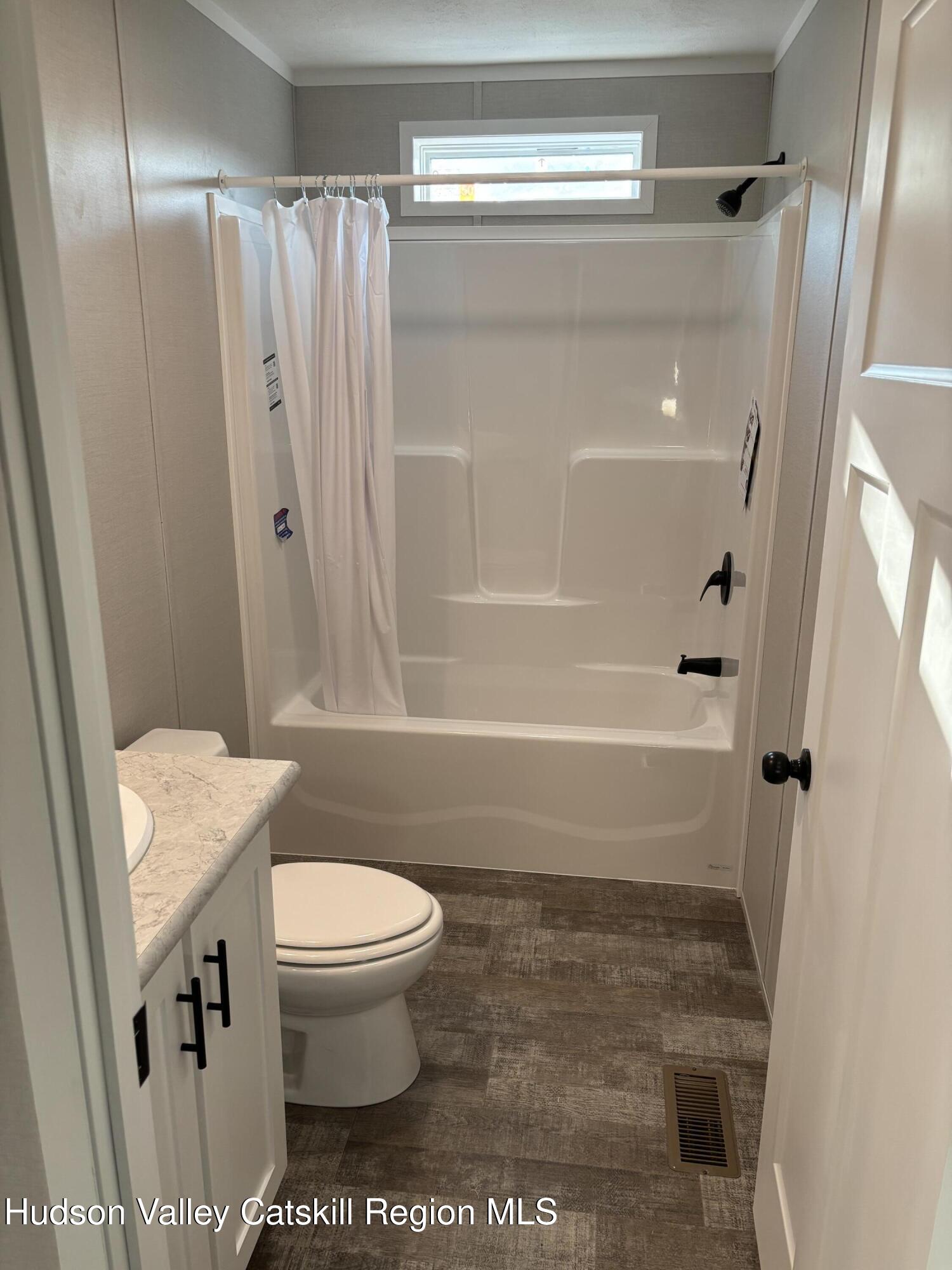 20 Mt View Way Stephentown, NY 12168 - Photo 14 of 14 a bathroom with a toilet and a shower