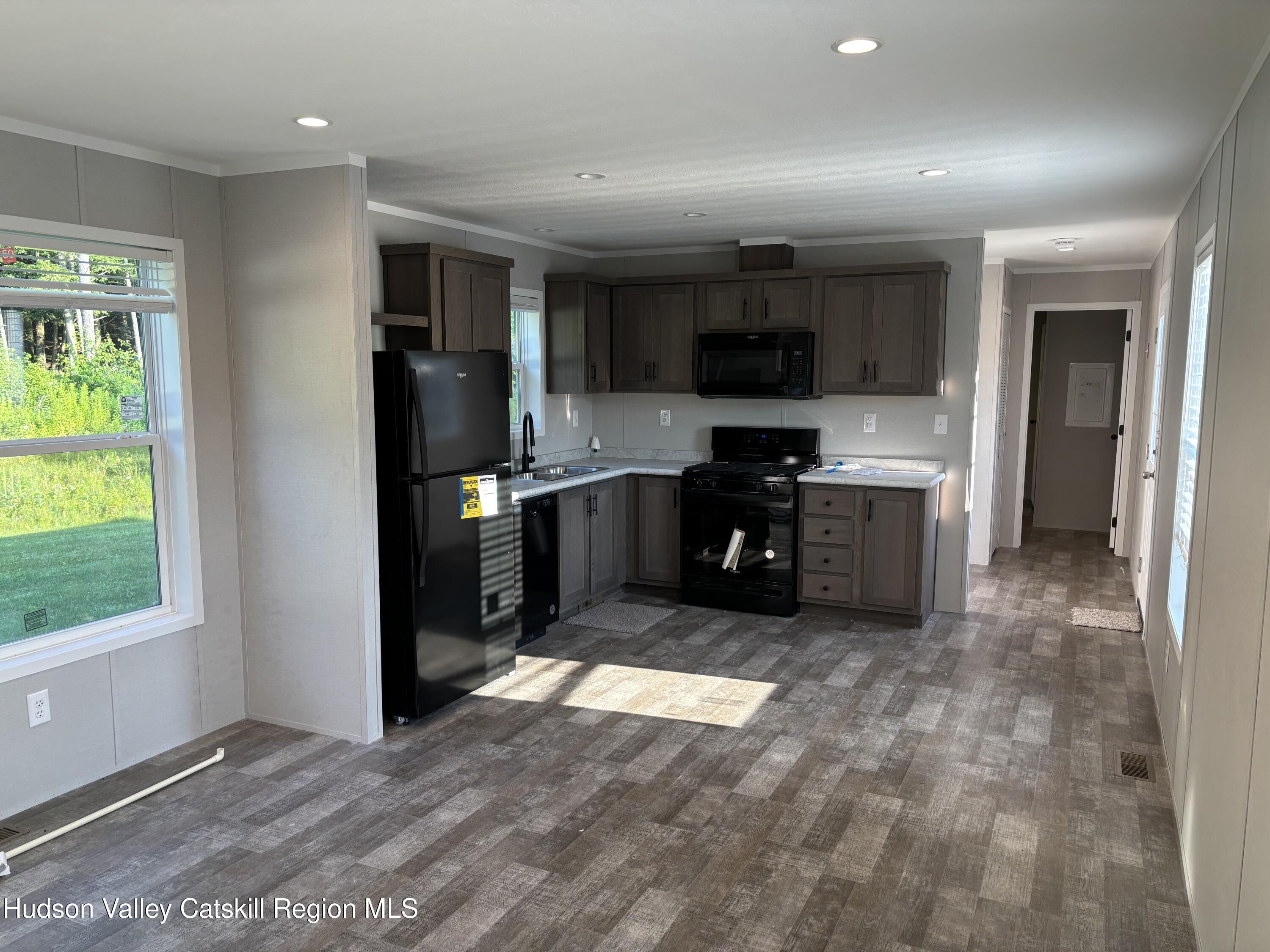 20 Mt View Way Stephentown, NY 12168 - Photo 3 of 14 a kitchen with stainless steel appliances granite countertop a refrigerator and a sink