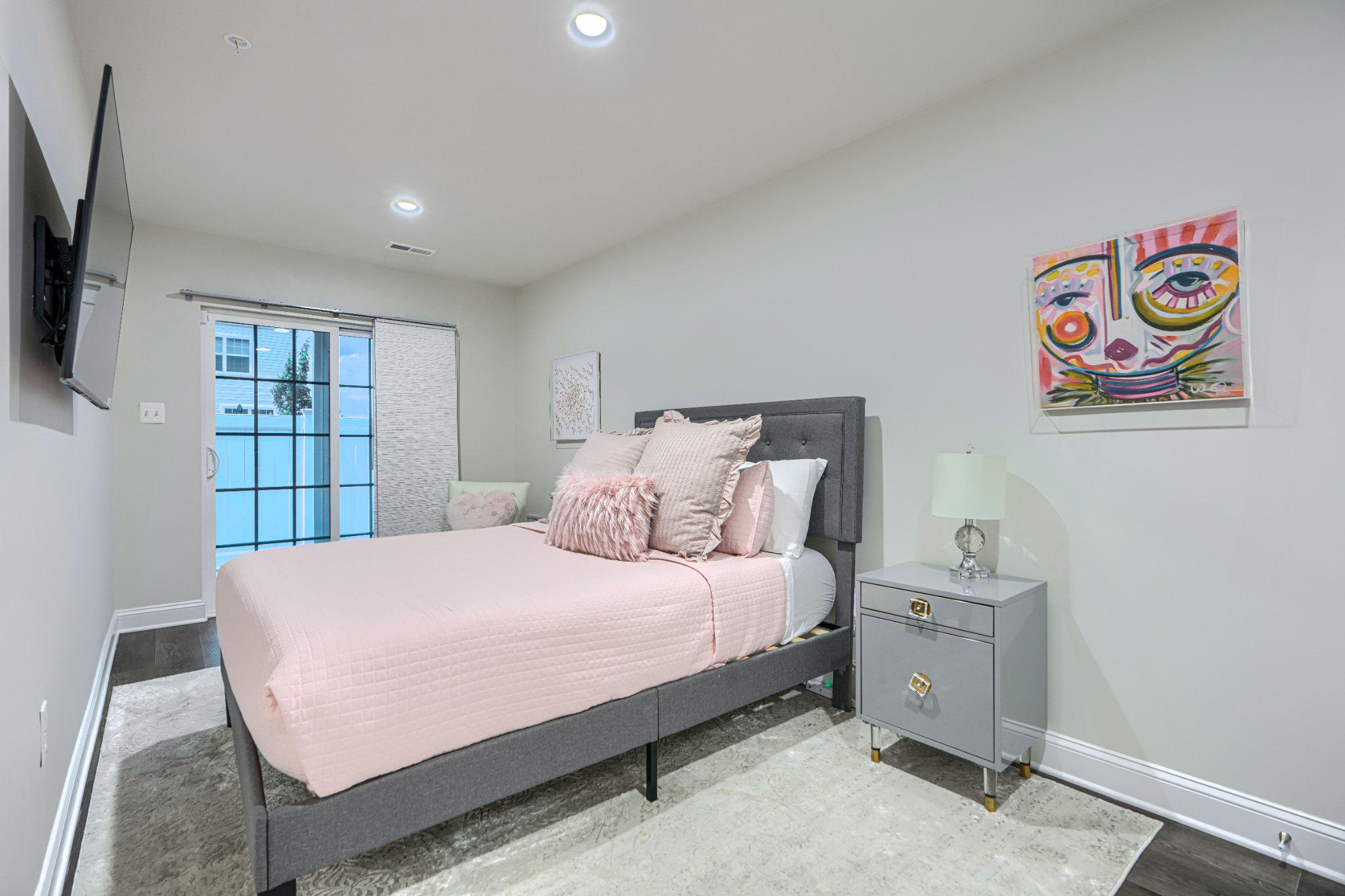 2707 Lady Slipper Road Gambrills, MD 21054 - Photo 53 of 60 a bedroom with a bed and a book shelf