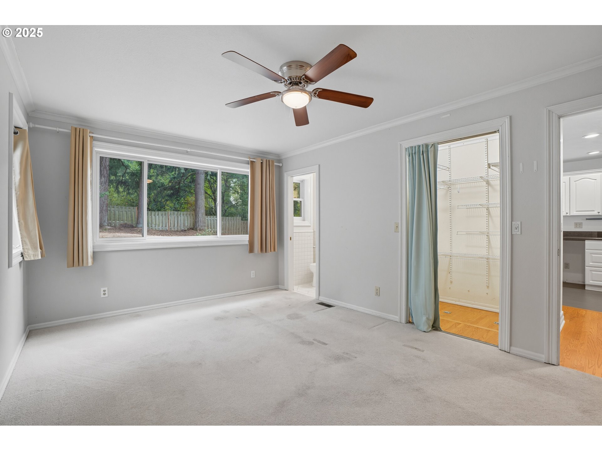 9360 Southwest Meadow Lane Portland, OR 97225 - Photo 17 of 48 a view of an empty room with a window