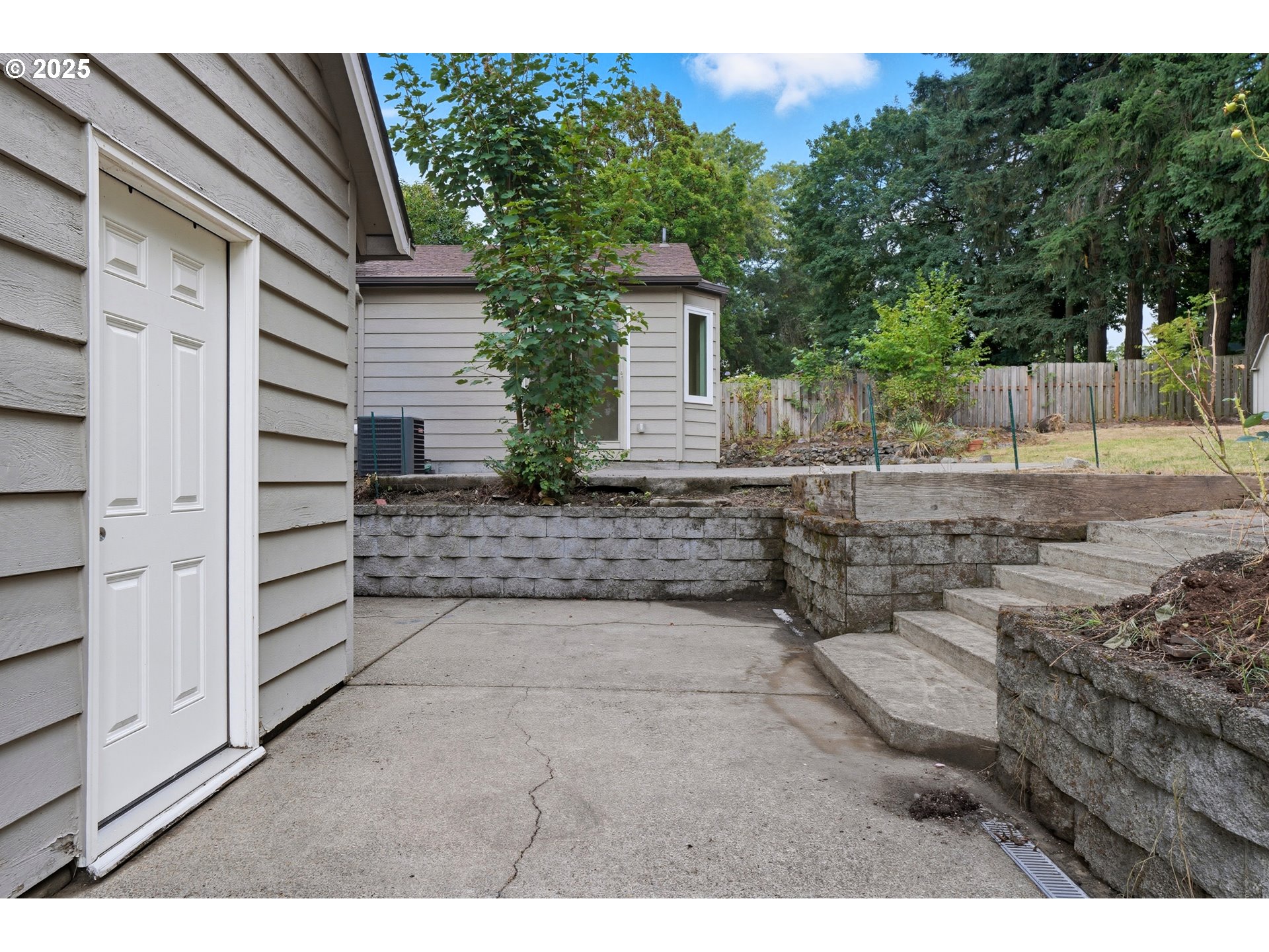 9360 Southwest Meadow Lane Portland, OR 97225 - Photo 29 of 48 a view of a backyard of the house