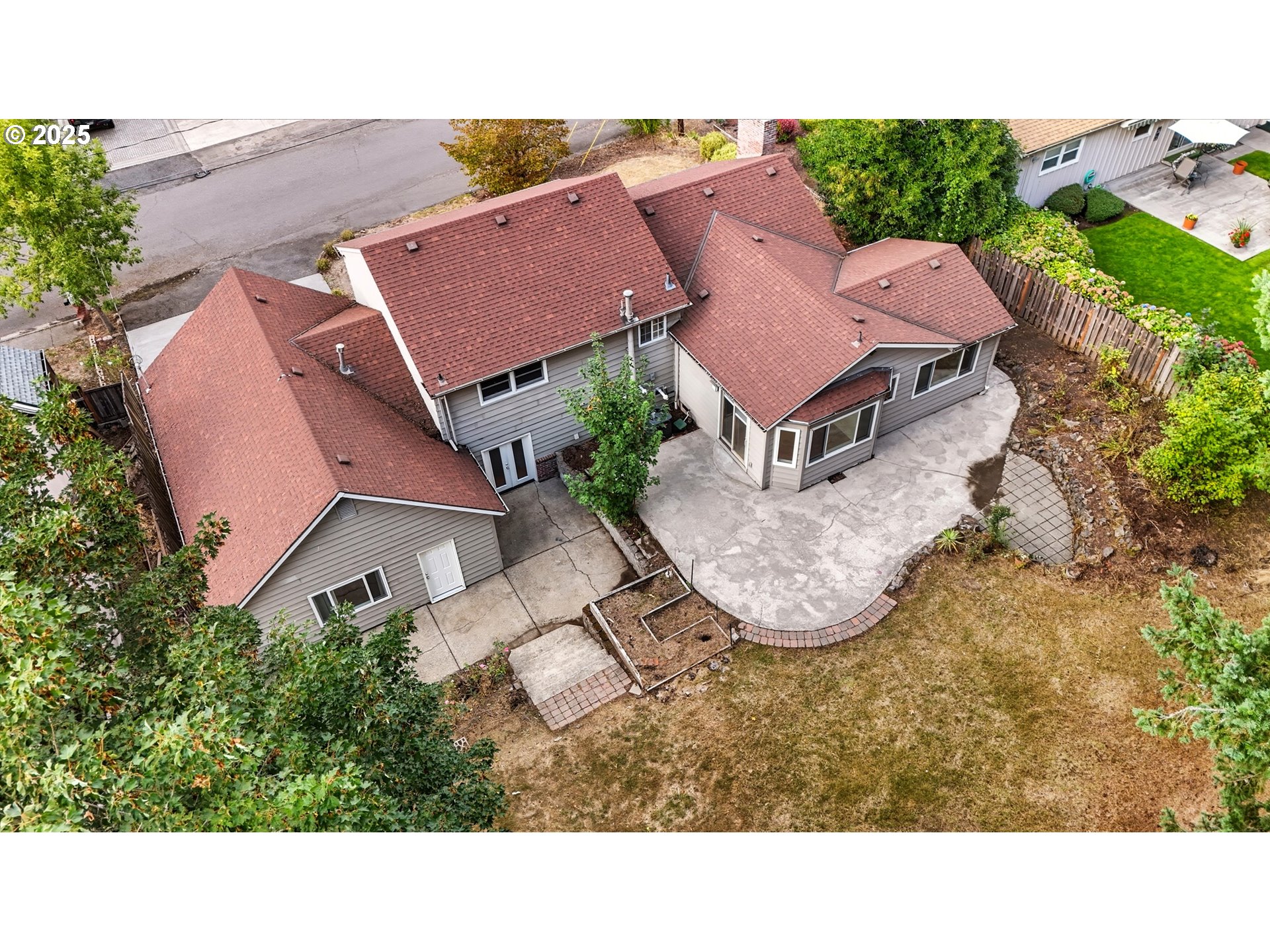 9360 Southwest Meadow Lane Portland, OR 97225 - Photo 40 of 48 a aerial view of a house with yard and street view