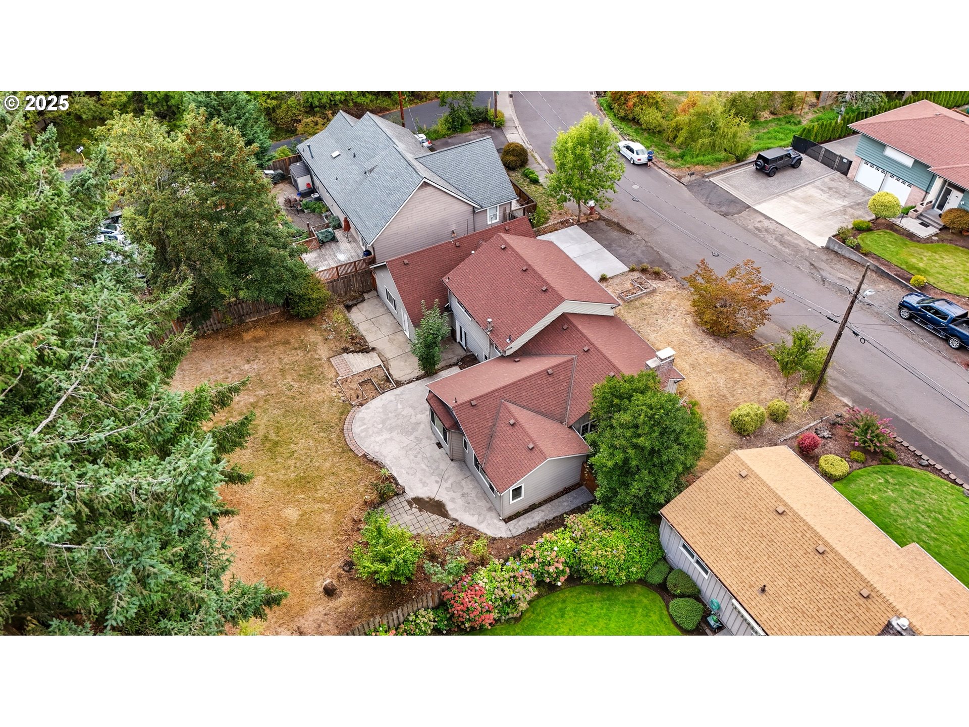 9360 Southwest Meadow Lane Portland, OR 97225 - Photo 41 of 48 an aerial view of a house with a yard