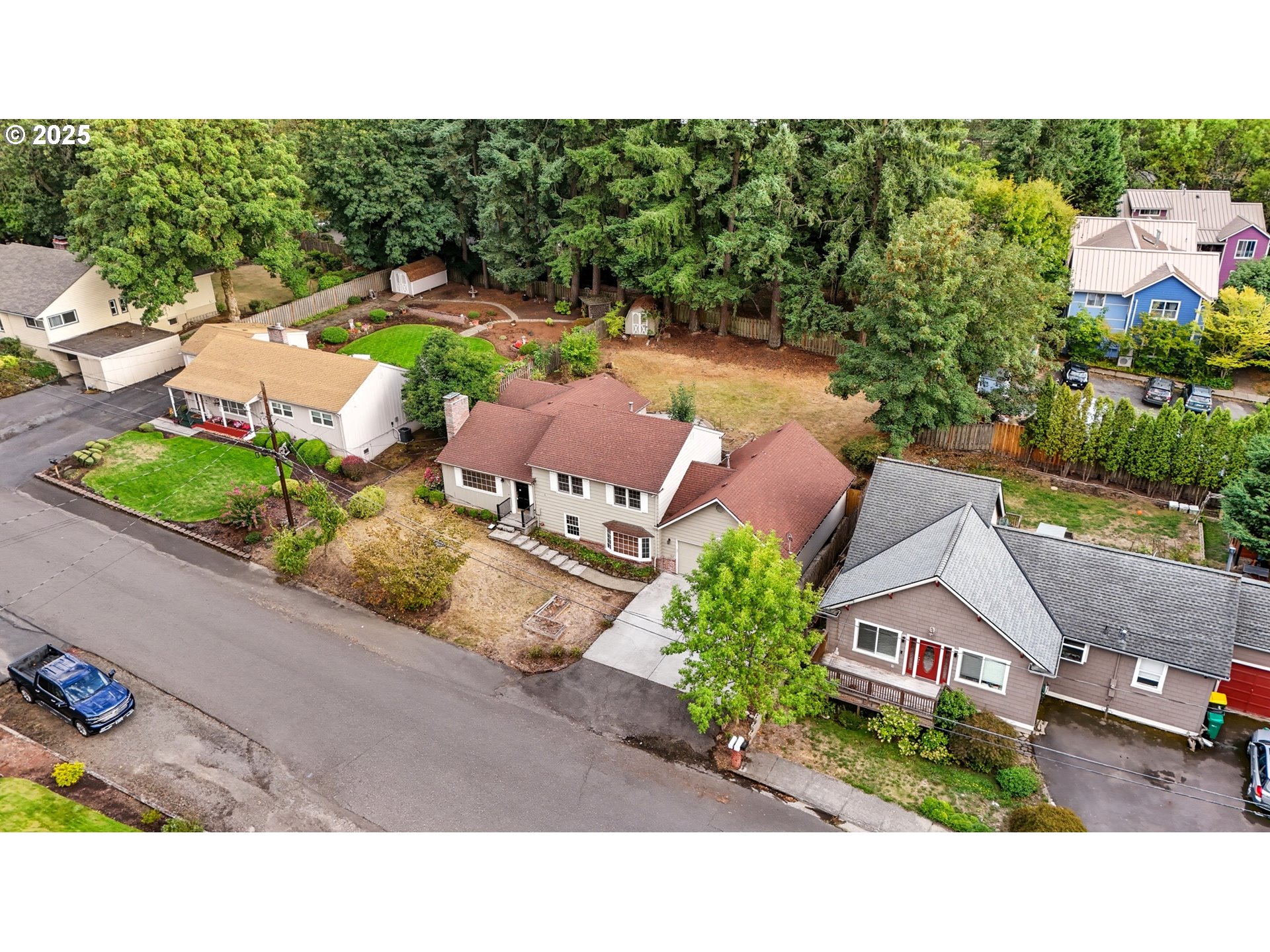 9360 Southwest Meadow Lane Portland, OR 97225 - Photo 44 of 48 a aerial view of a house with garden space and street view