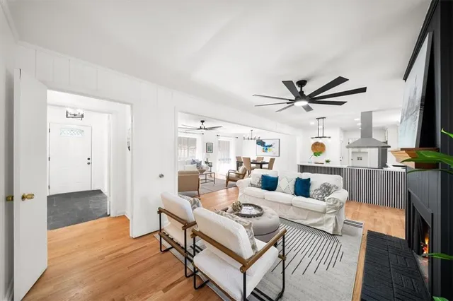 a living room with furniture and a window