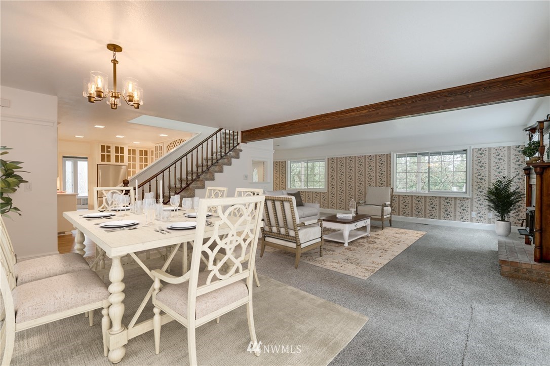 611 Newberg Road Snohomish, WA 98290 - Photo 11 of 40 a view of a livingroom with furniture wooden floor and a chandelier