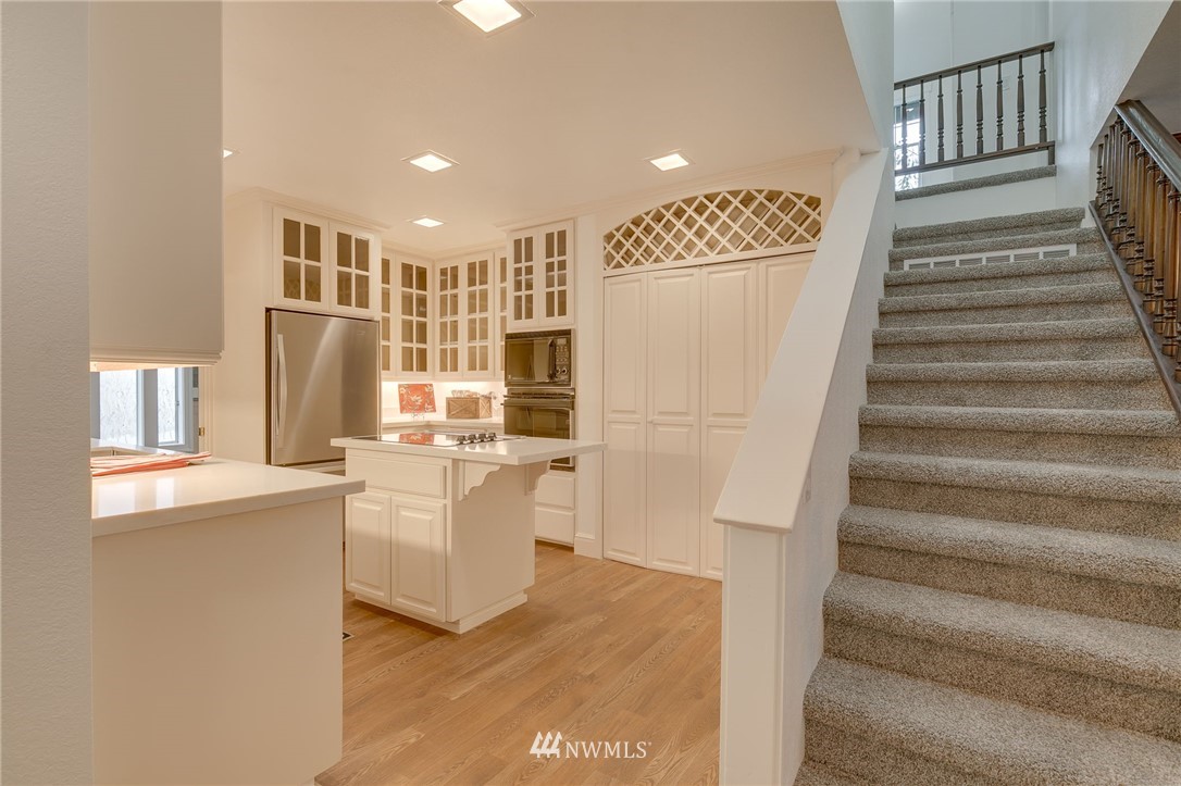 611 Newberg Road Snohomish, WA 98290 - Photo 14 of 40 a view of entryway with wooden floor and stairs