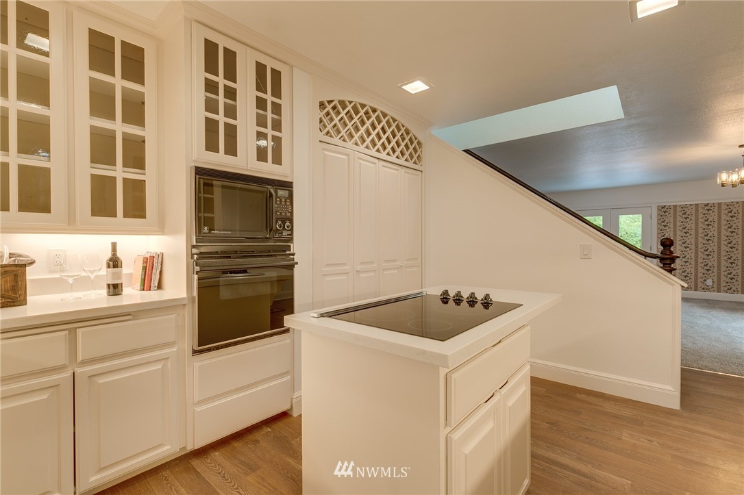 611 Newberg Road Snohomish, WA 98290 - Photo 19 of 40 a kitchen with a sink and a refrigerator