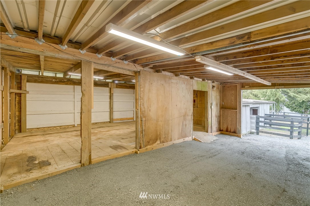 611 Newberg Road Snohomish, WA 98290 - Photo 37 of 40 a view of empty room with wooden floor