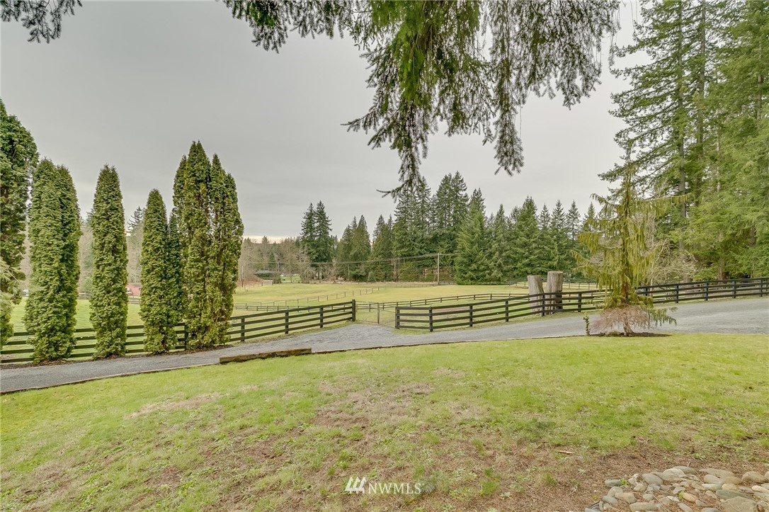611 Newberg Road Snohomish, WA 98290 - Photo 38 of 40 a view of a yard with swimming pool