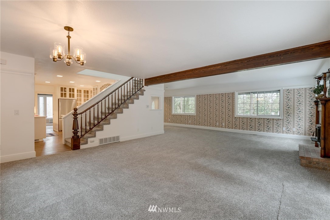 611 Newberg Road Snohomish, WA 98290 - Photo 10 of 40 a view of empty room with stairs