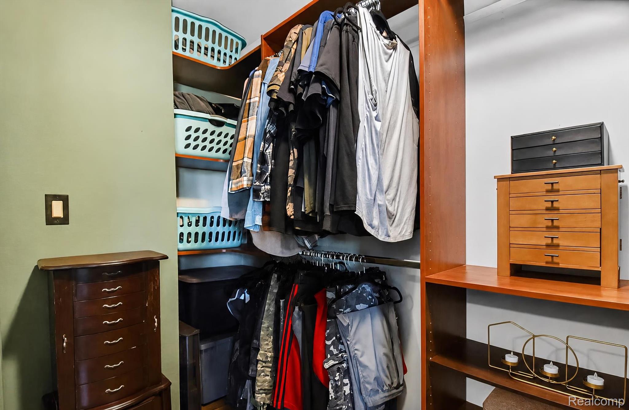 3949 West Burns Line Road Brown City, MI 48416 - Photo 60 of 70 Custom closet system featuring wood-finish shelving and hanging rods