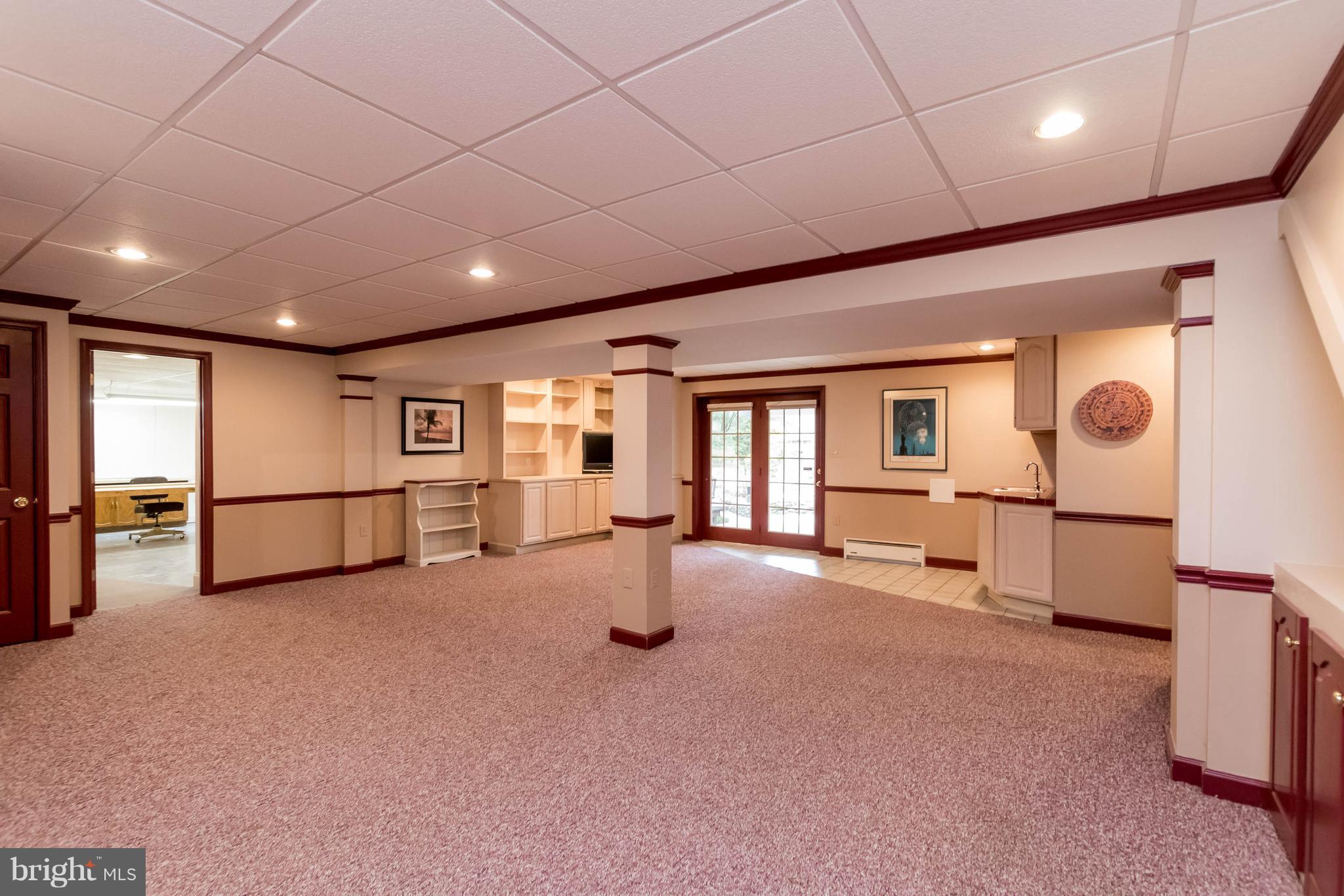 14013 Foxland Road Phoenix, MD 21131 - Photo 25 of 30 Lower level family room w/wet bar & full bath
