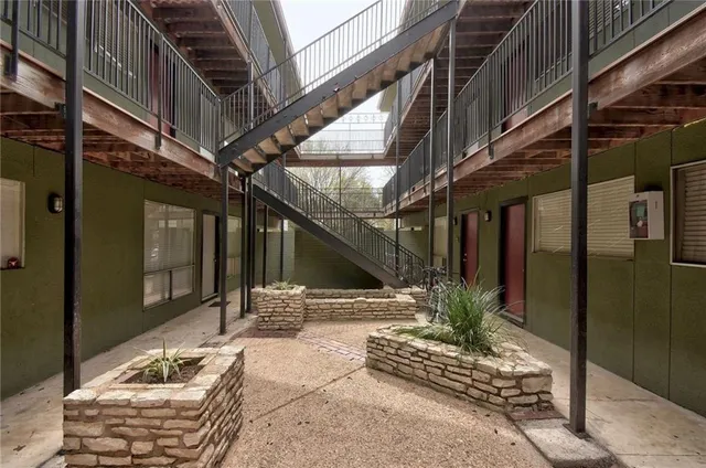 a building with glass door and glass windows