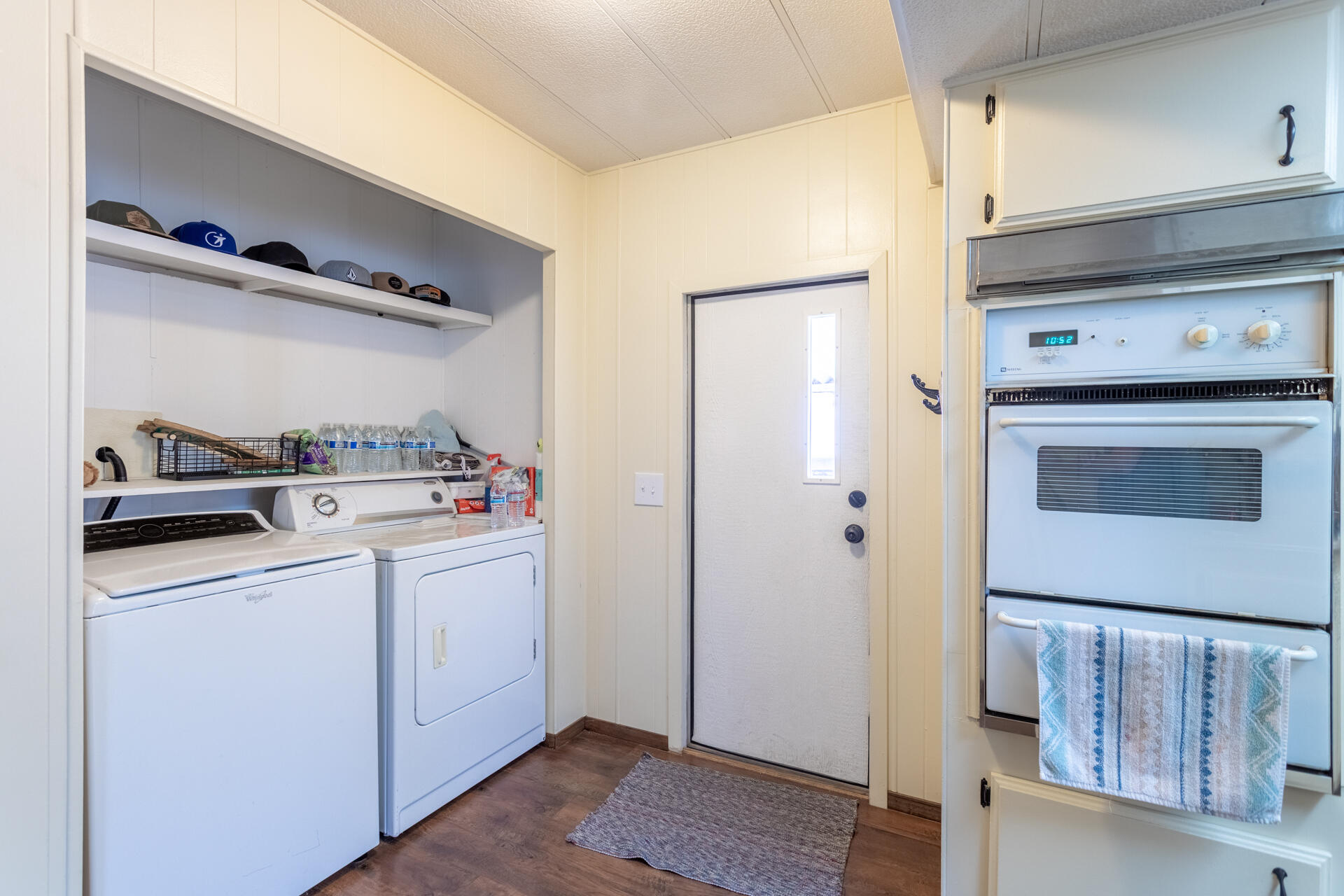 1272 Mountain Shadows Boulevard Redding, CA 96003 - Photo 14 of 22 a utility room with cabinets washer and dryer