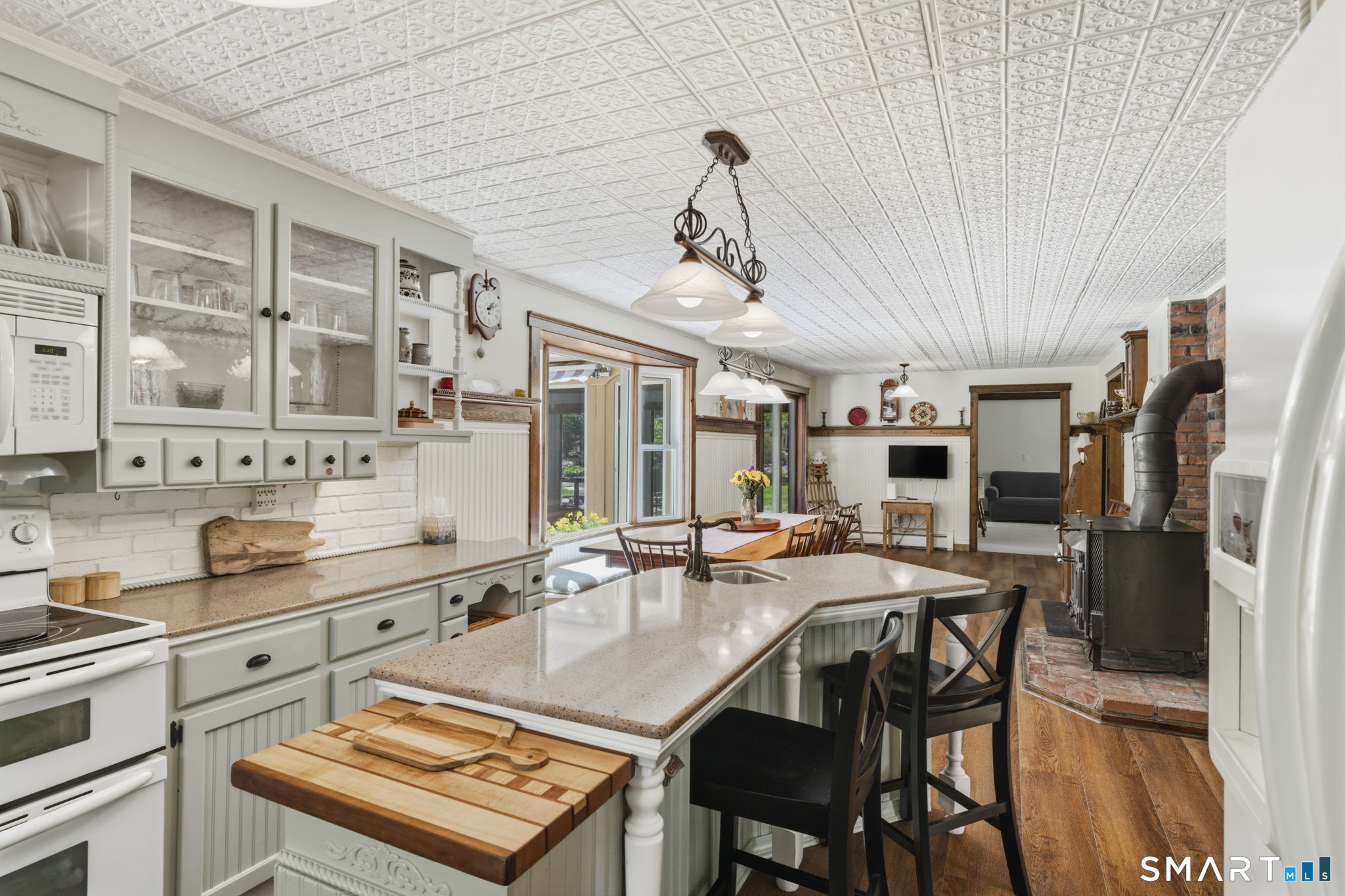 79 Buckboard Lane Bristol, CT 06010 - Photo 15 of 40 a large kitchen with a table and chairs