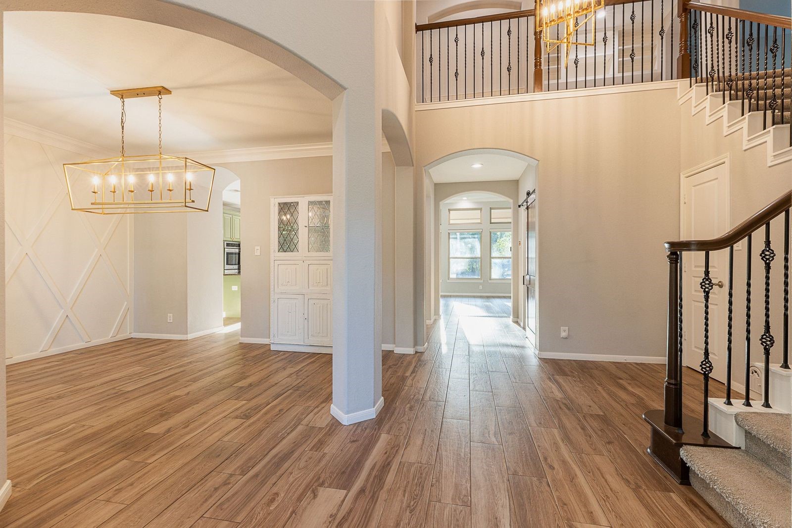 1122 Silveridge Conroe, TX 77304 - Photo 7 of 46 Formal dining with new light fixture and great flow