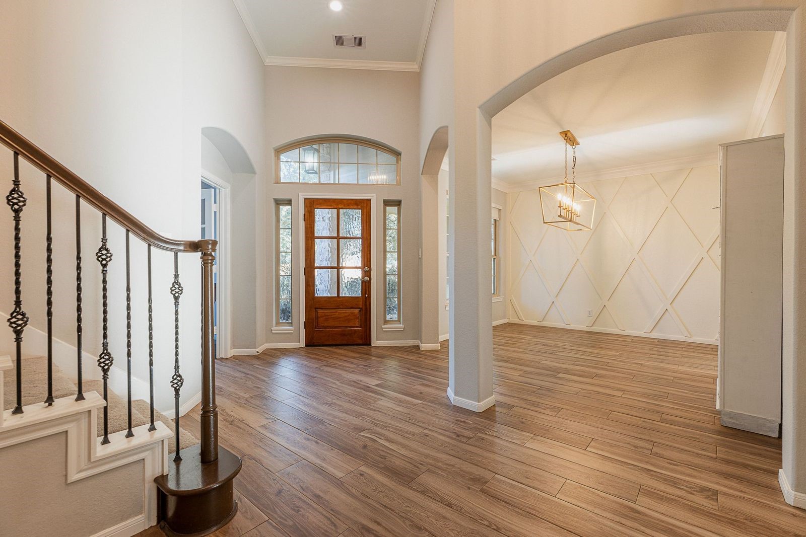 1122 Silveridge Conroe, TX 77304 - Photo 8 of 46 Gorgeous, custom accent wall in the formal dining