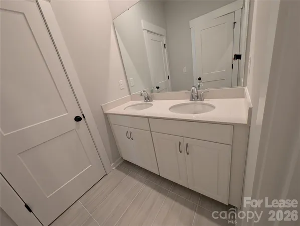 a bathroom with a bathtub and a toilet
