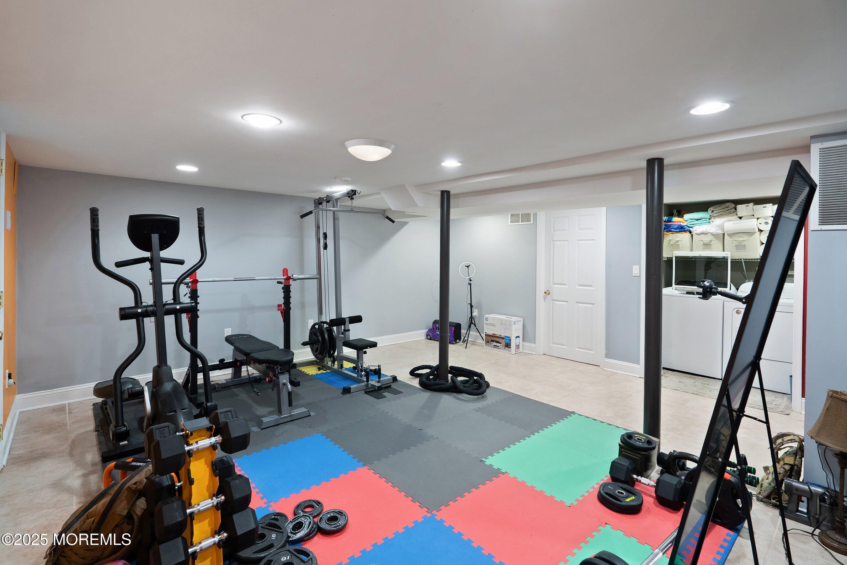 21 Drexel Drive Jackson, NJ 08527 - Photo 16 of 36 a view of a room with gym equipment