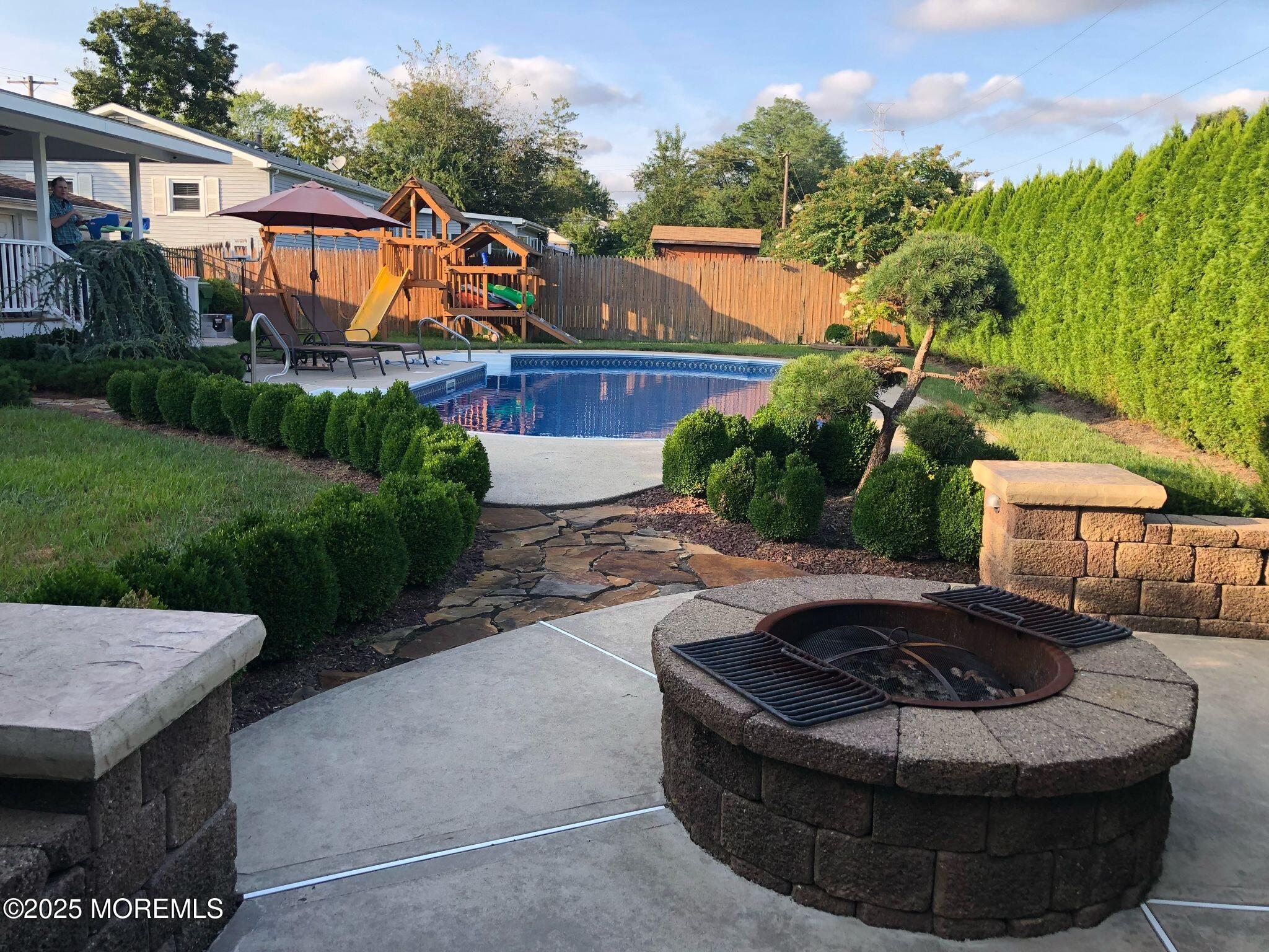 21 Drexel Drive Jackson, NJ 08527 - Photo 26 of 36 a view of a house with backyard sitting area and swimming pool