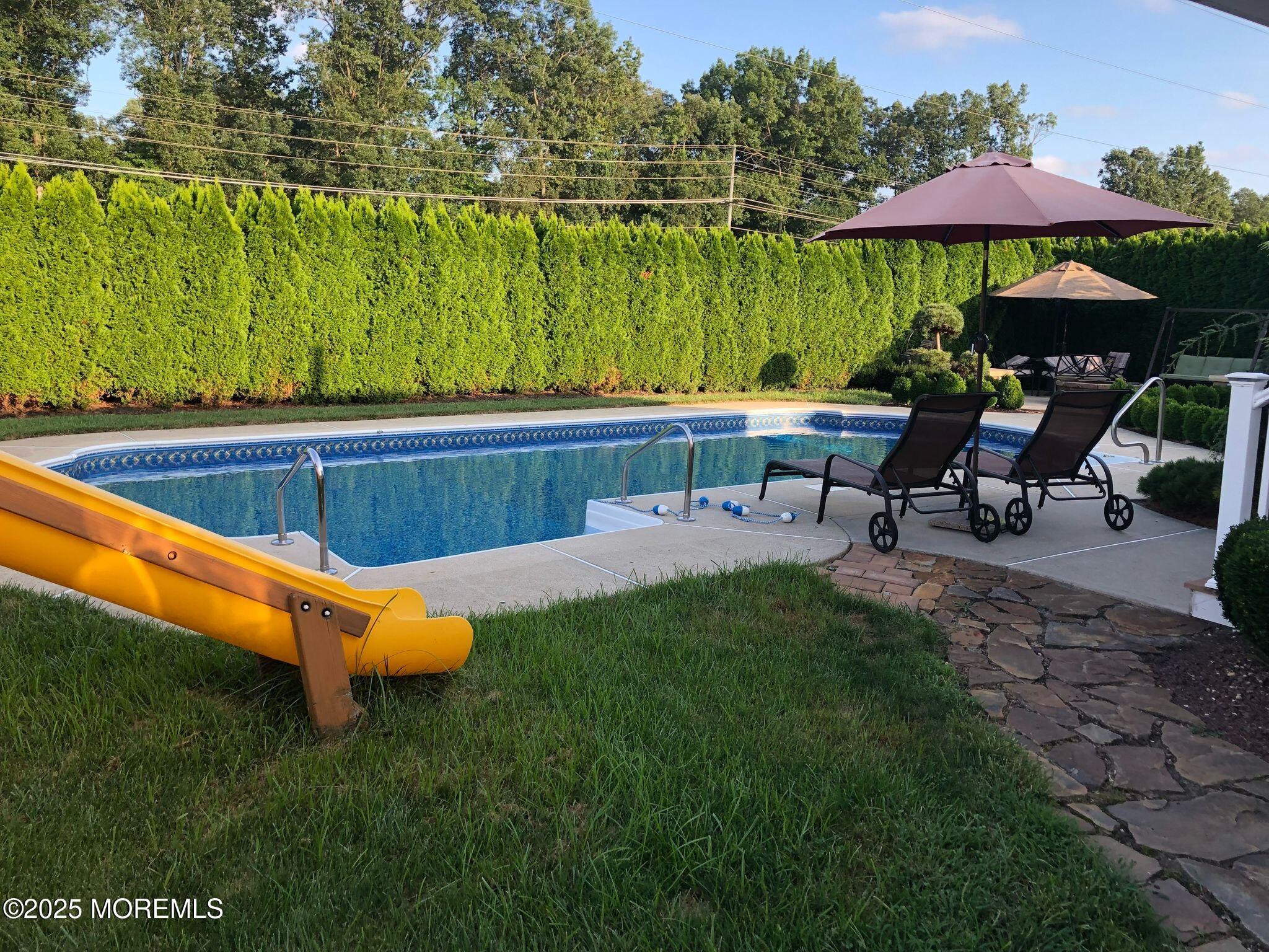 21 Drexel Drive Jackson, NJ 08527 - Photo 27 of 36 an outdoor sitting area with a lake view
