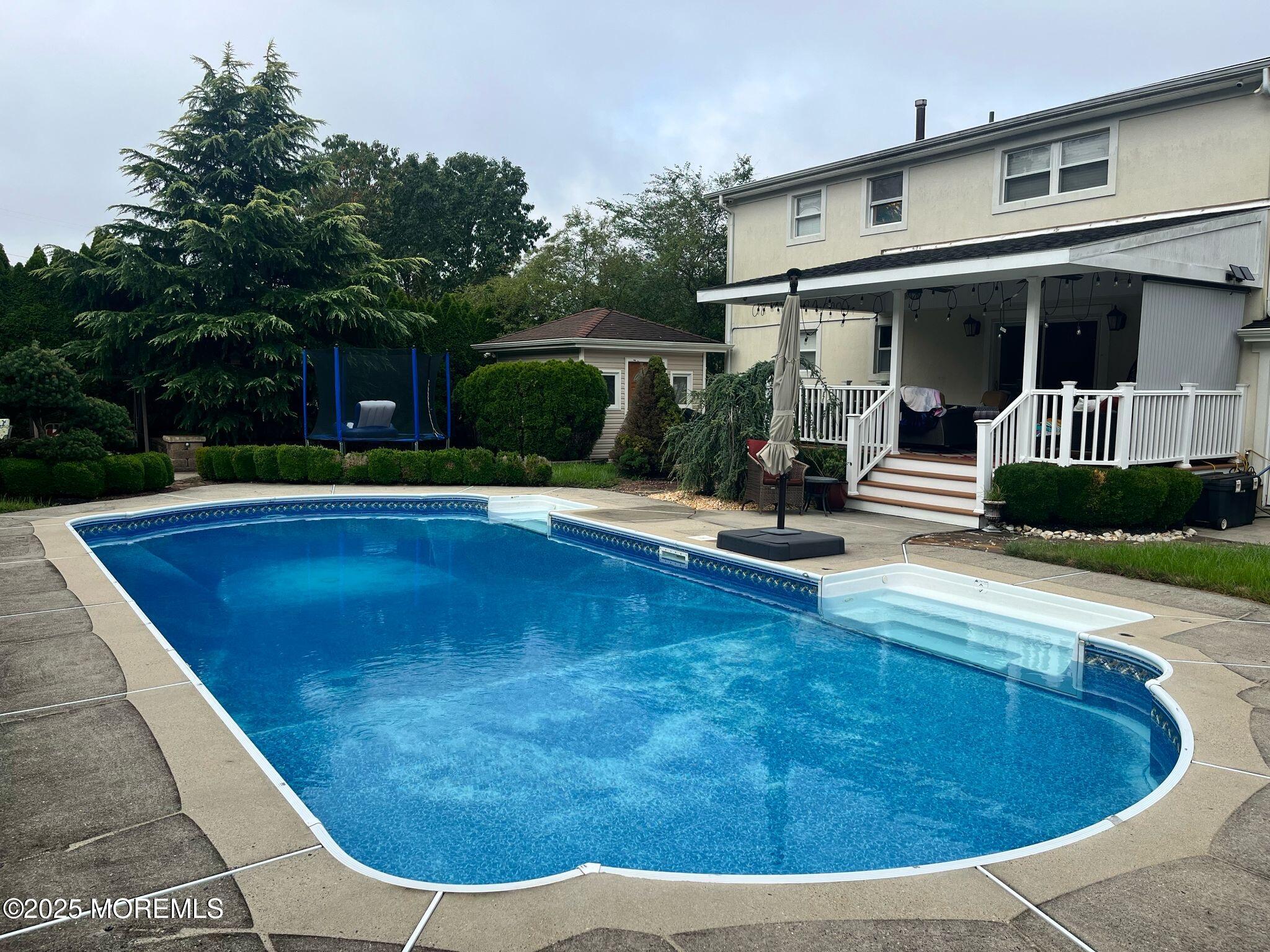 21 Drexel Drive Jackson, NJ 08527 - Photo 30 of 36 a view of outdoor space yard and swimming pool