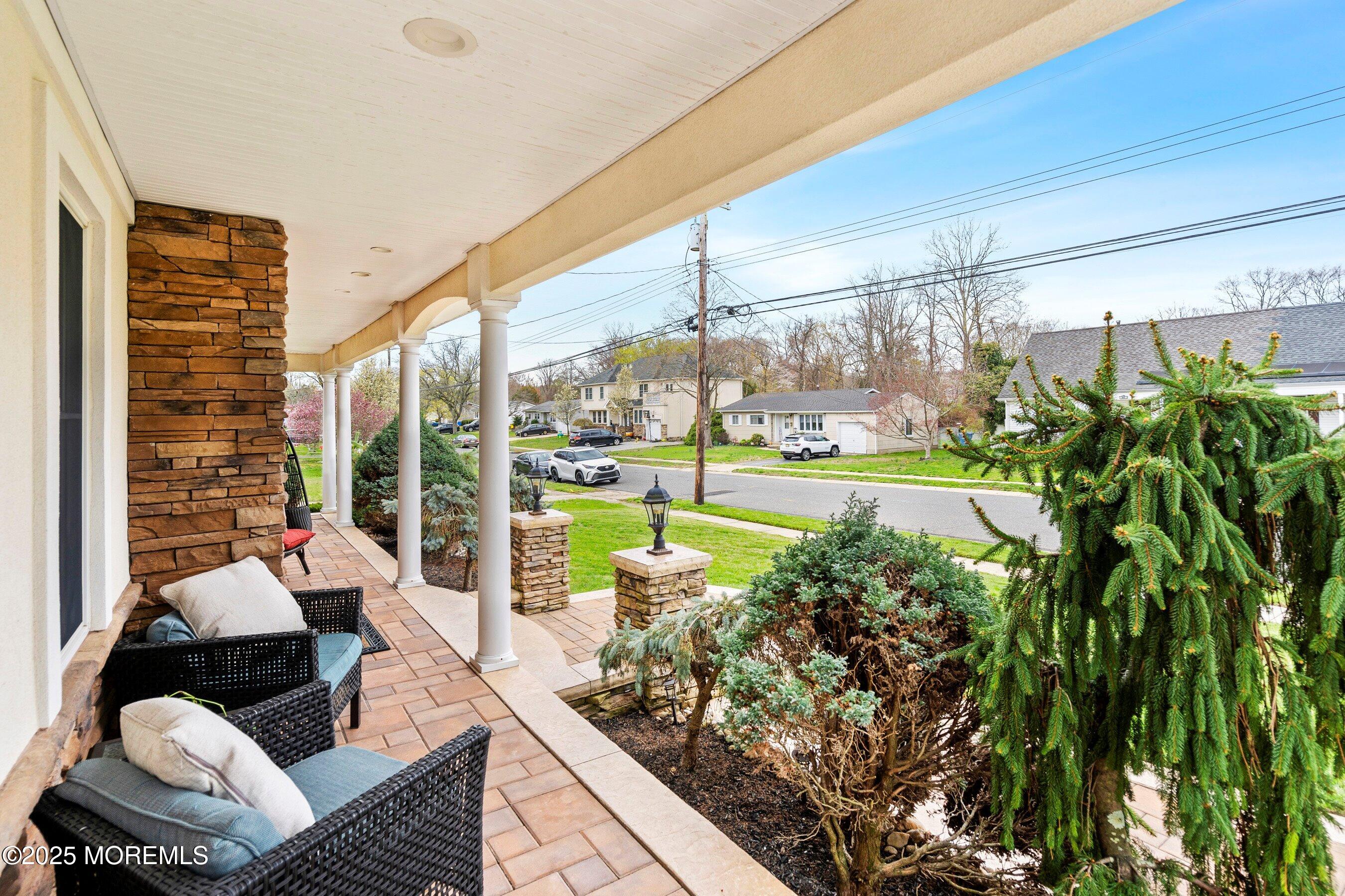 21 Drexel Drive Jackson, NJ 08527 - Photo 3 of 36 a living room filled with furniture and a floor to ceiling window