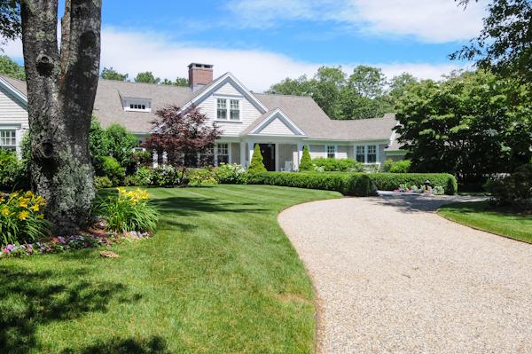 123 Bunker Hill Road Barnstable, MA 02655 - Photo 1 of 18 a front view of a house with a yard