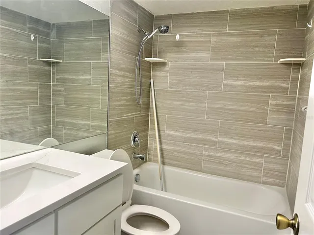 a bathroom with a sink and a bathtub