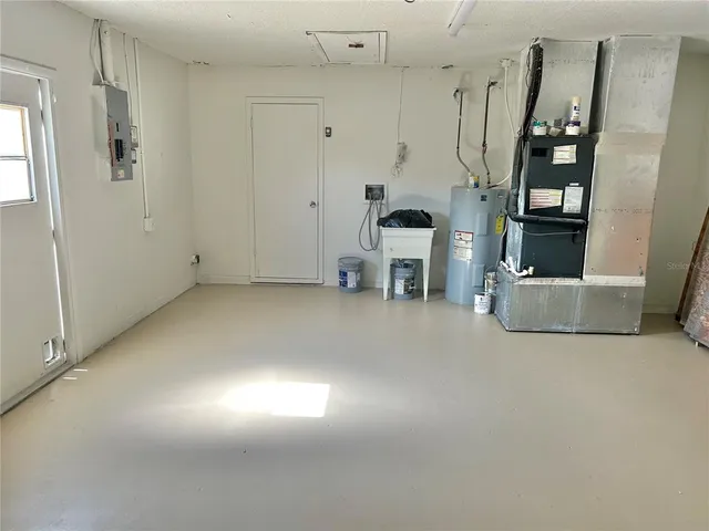 a view of kitchen and utility room