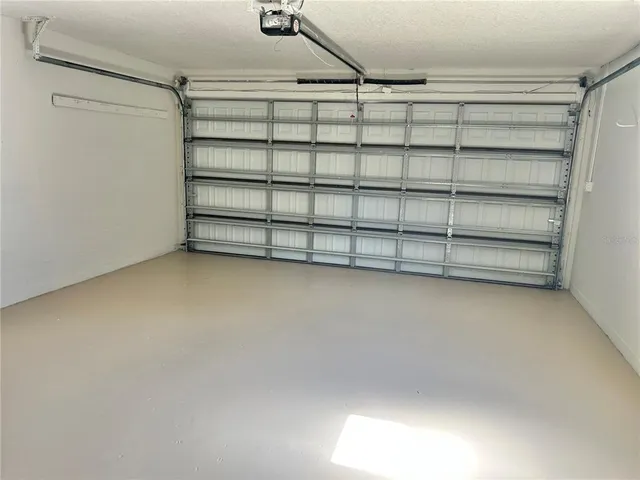 a view of a room with shelf on the wall