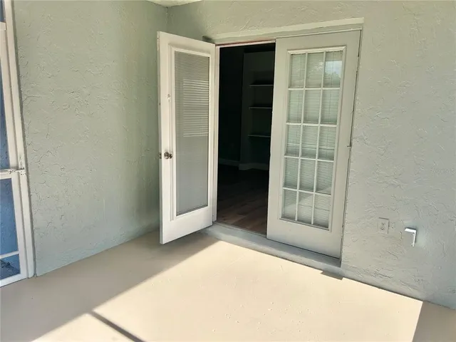 a view of an empty room with window