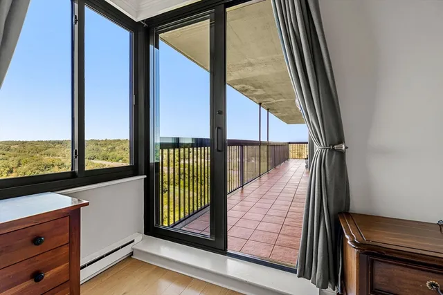 a bathroom with a sink mirror and a shower