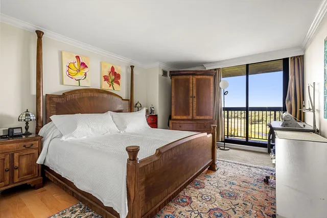 a bed room with a bed and a book shelf