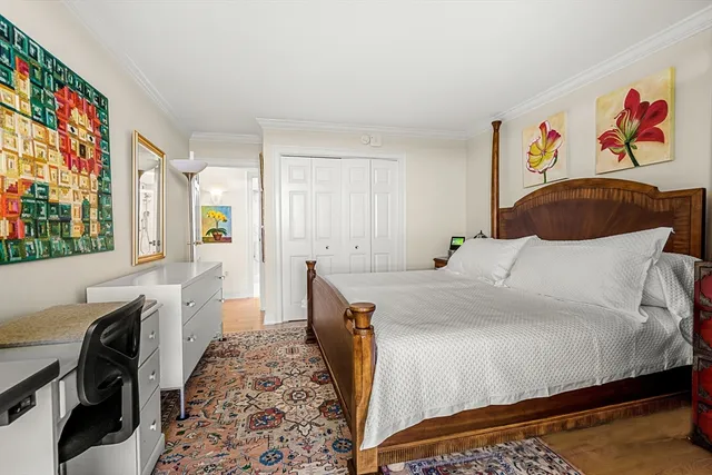 a view of a livingroom with furniture and staircase